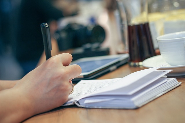 cinema education notebook storyboard and camera on desk
